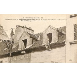 ABAO 75 - Paris [75] Paris 18 - Rue de la Chapelle, 28. Curieuses lucarnes en maçonnerie ...